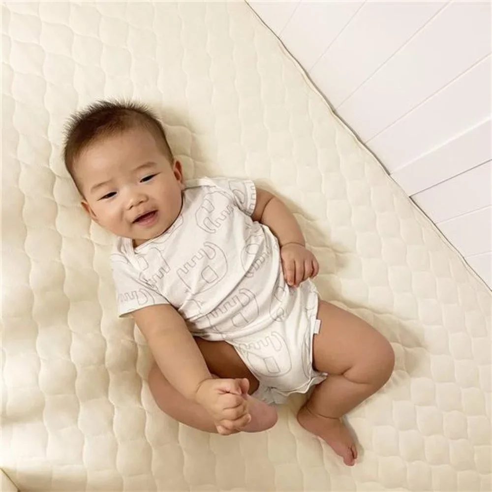 Waterproof Quilted Crib and Toddler Size Fitted Mattress Cover made with Organic